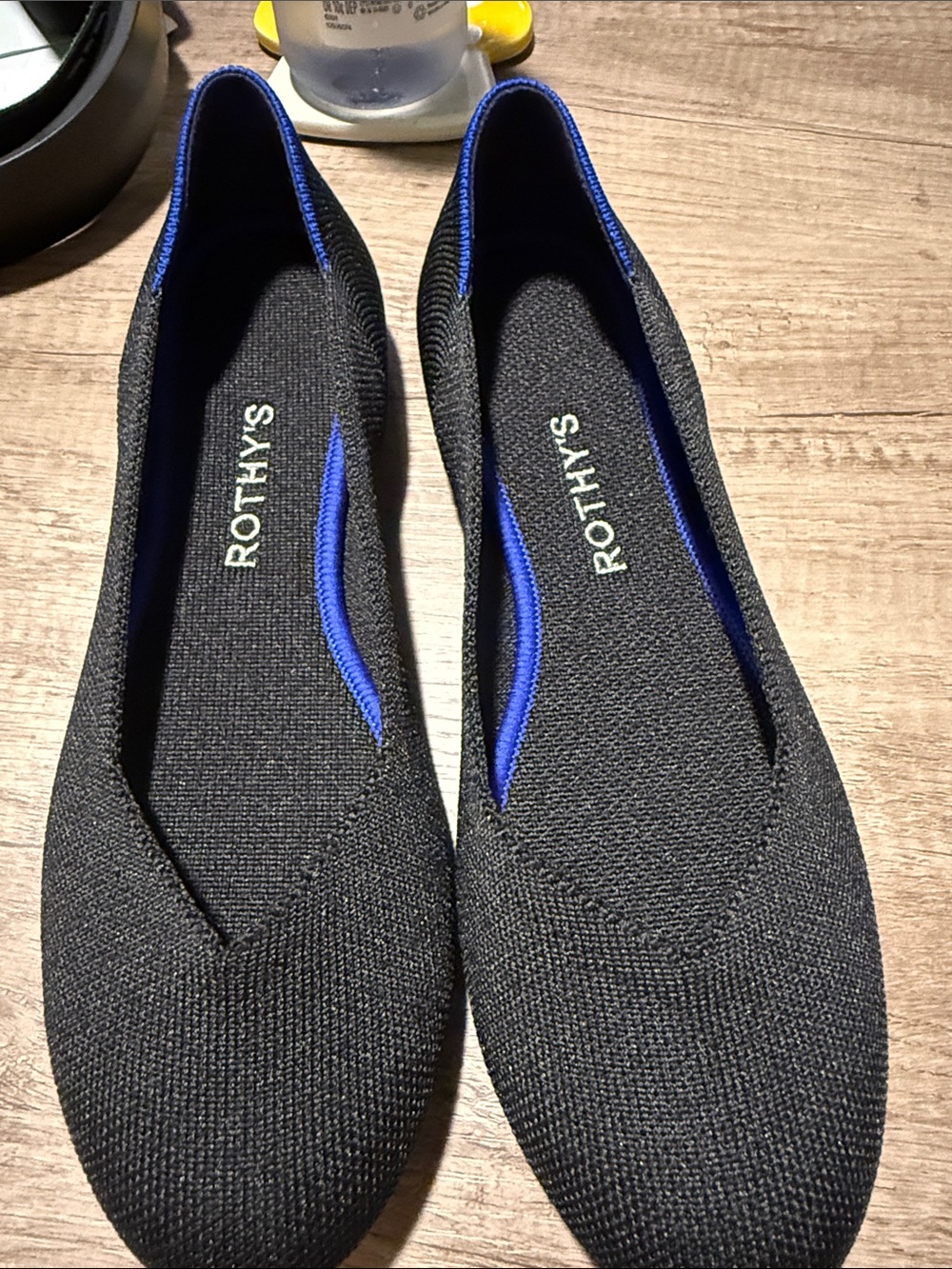 Rothy's Black Knit Slip-On Flats with Blue Trim